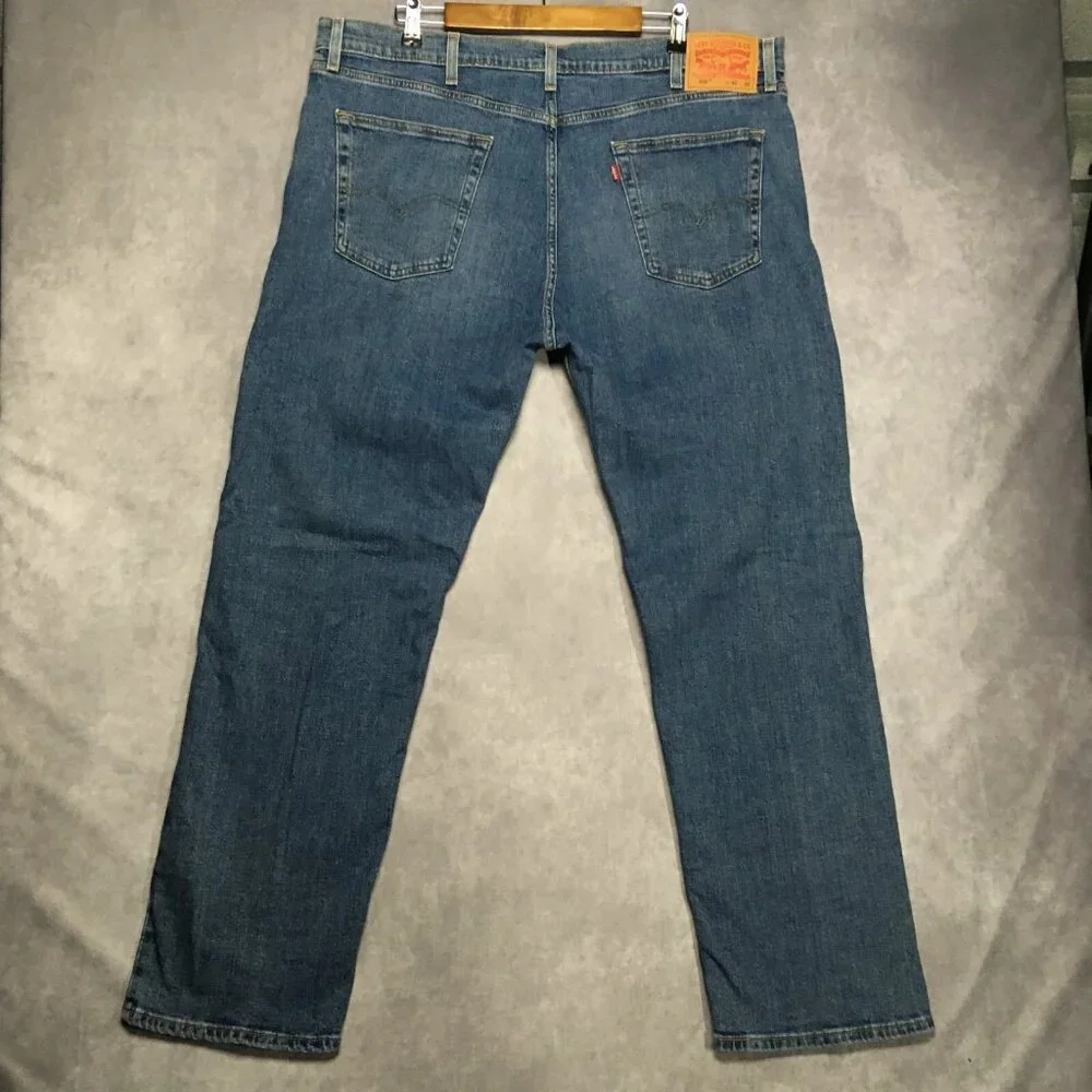 Levis Mens 505 Regular Fit Blue Jeans size 42x32 Stretch Denim Pants Cool Fading